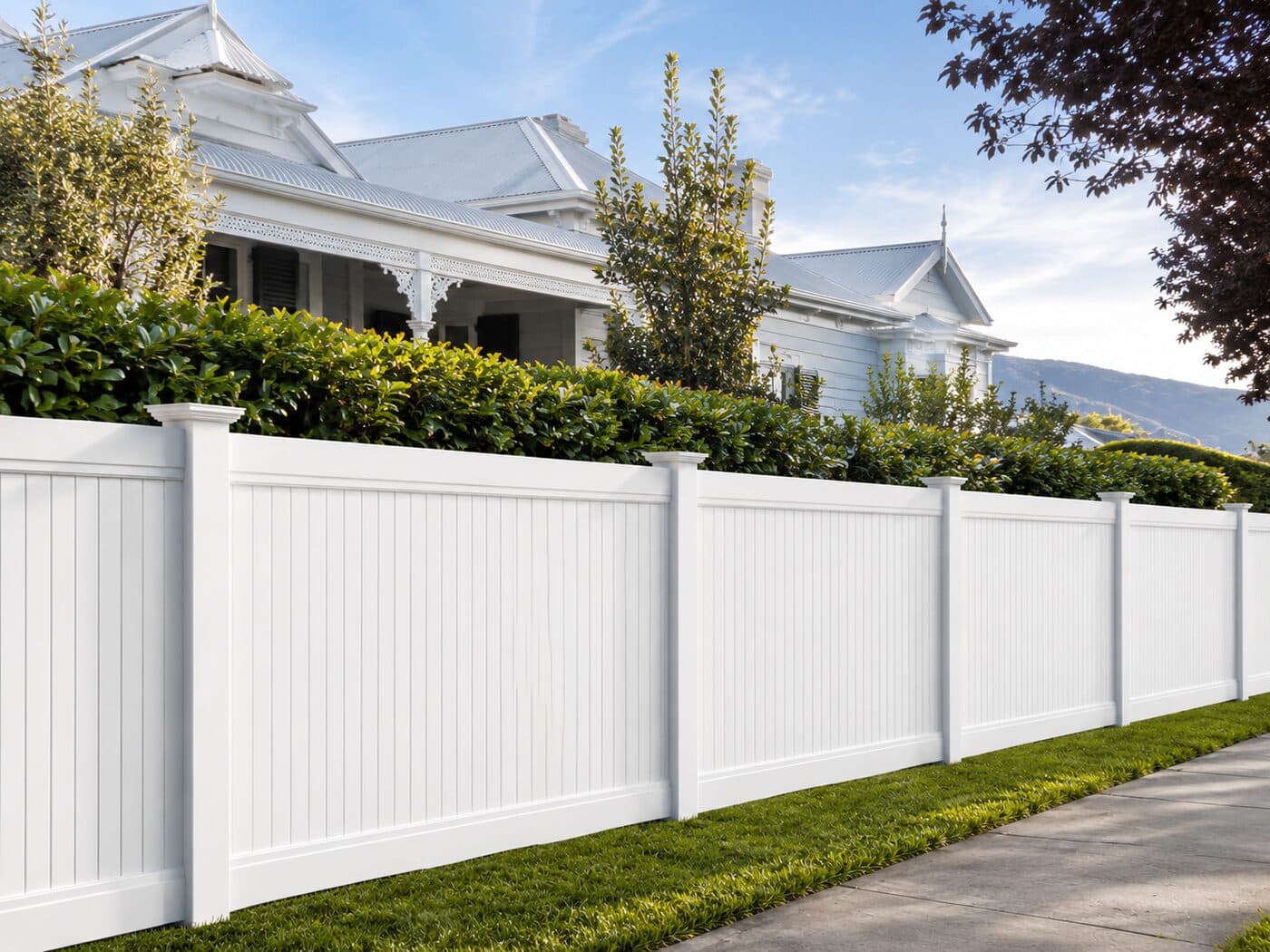 Ascot 1.8 metre full-privacy fence in front of a coastal Queenslander.